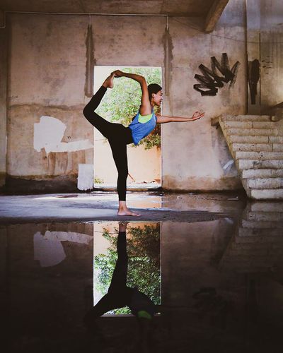 Empty yoga mat in a room with soft, natural light.
